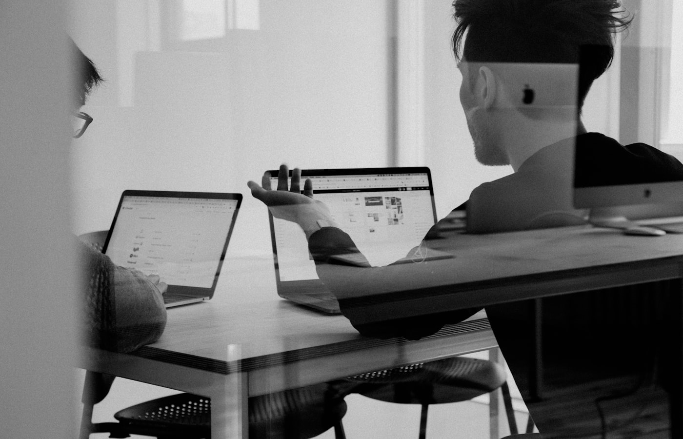 Corporate leaders reviewing training outcomes at a strategy session